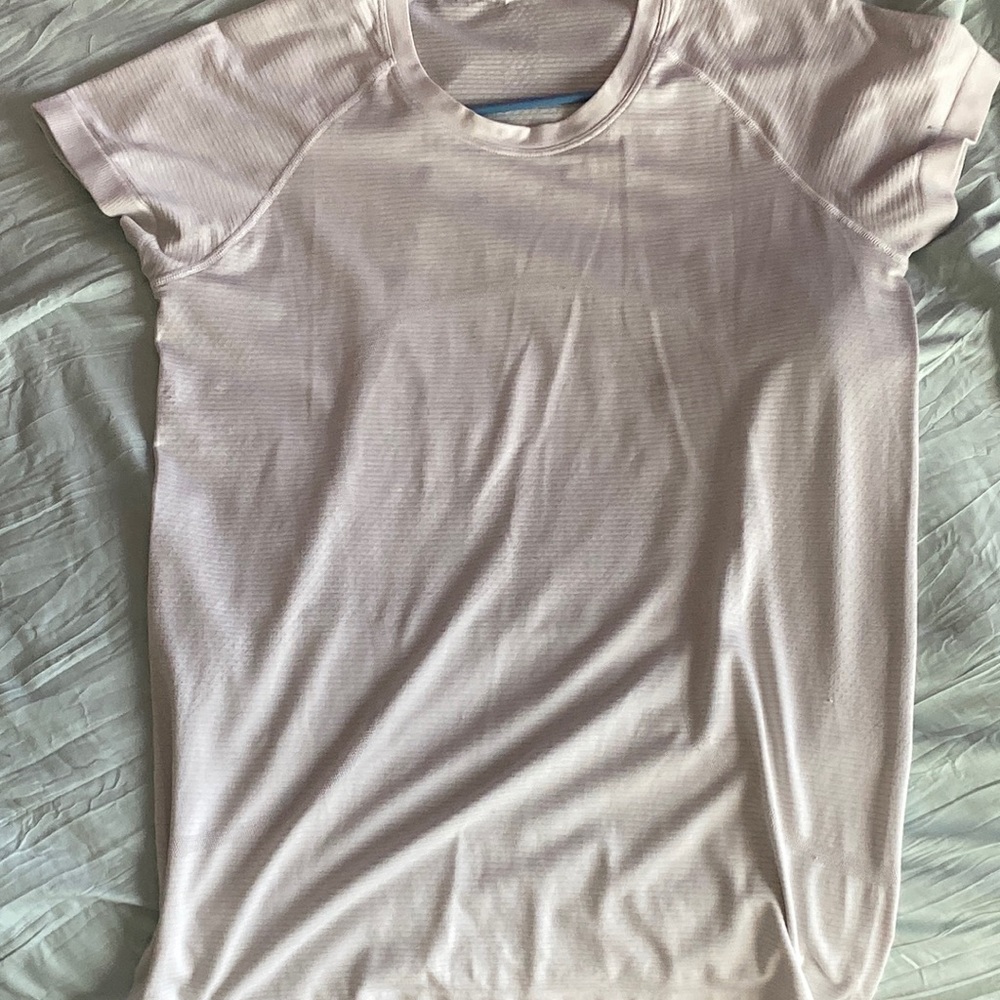Lululemon white swiftly tech size 10 but could fit a 12.